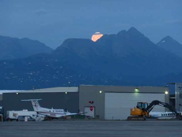 Blue Moon over Anchorage Airport, and behind Flattop-- 10:58 pm. 7.31.15, Anchorage, Ak